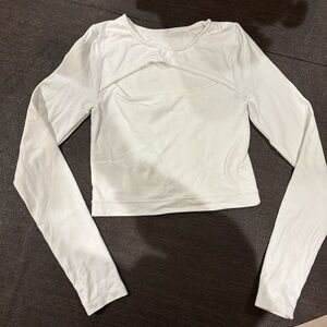 Elegant White Long Sleeve Women's Top with Cutout in Chest Area